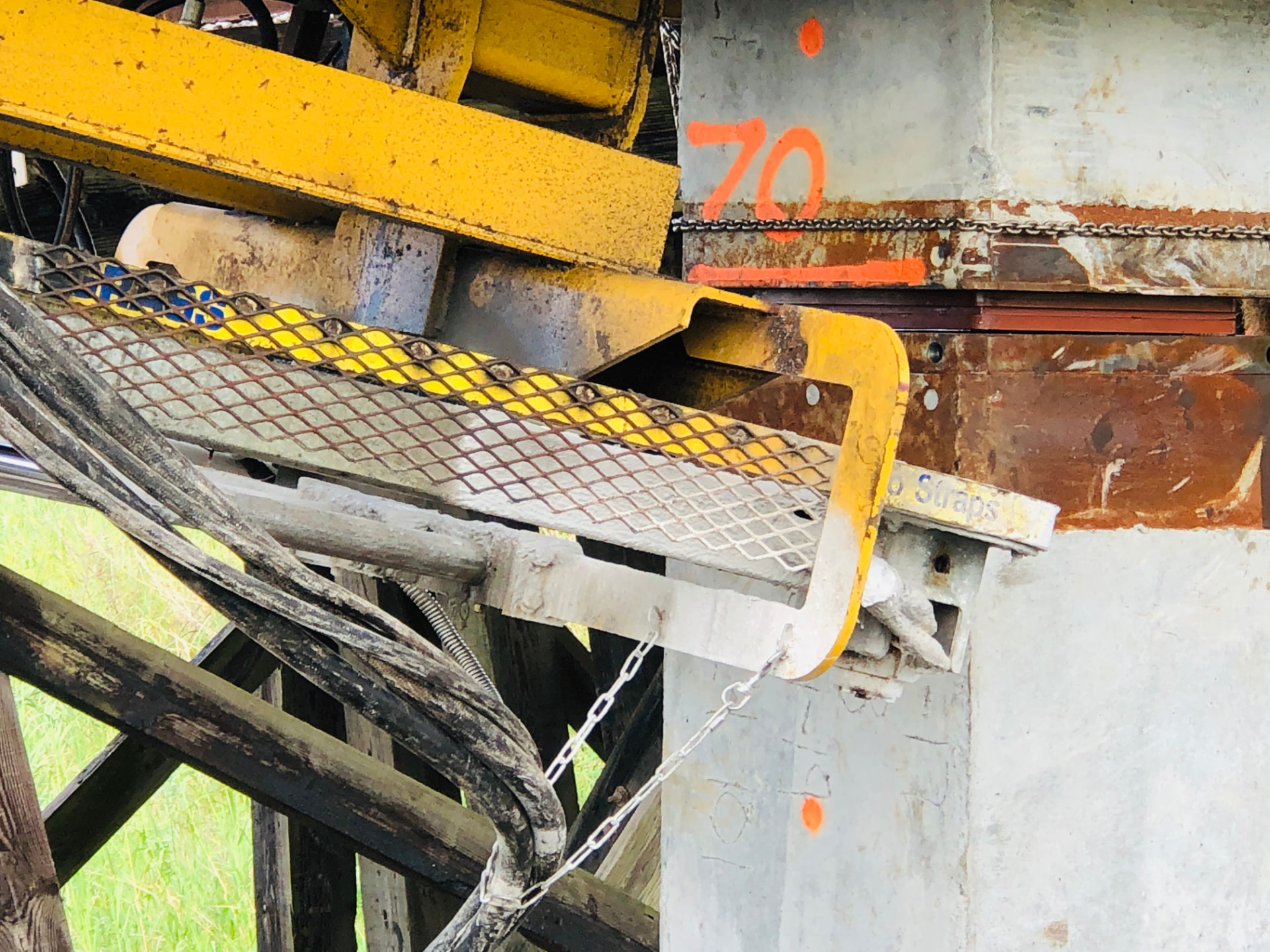 Heavy industrial equipment and structural components on a construction site